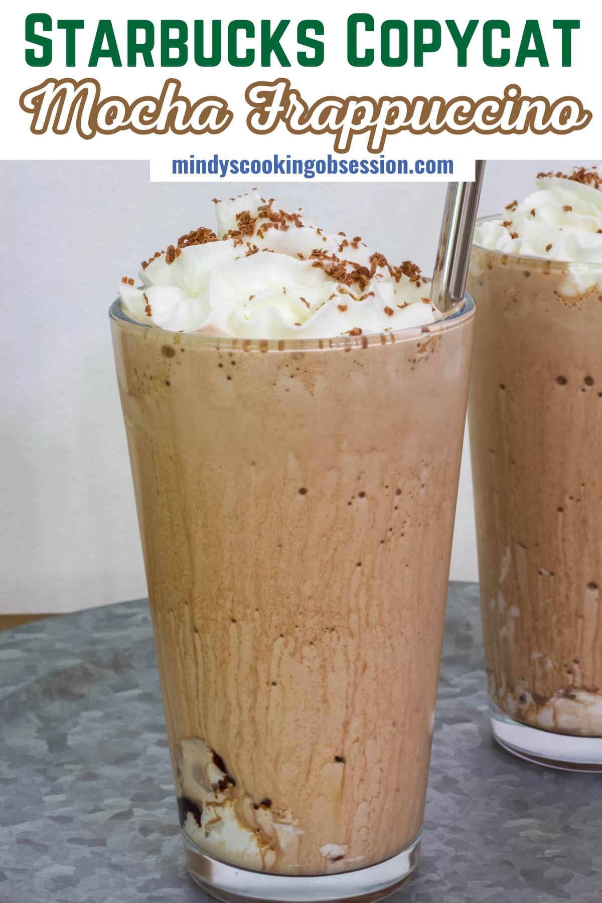 Making a Starbucks Frappuccino at home has never been easier with our easy and delicious recipe. Instant coffee granules, milk, chocolate sauce and ice are blended together and then topped with whipped cream and shaved chocolate. It's the perfect frozen coffee drink, especially on hot days! via @mindyscookingobsession